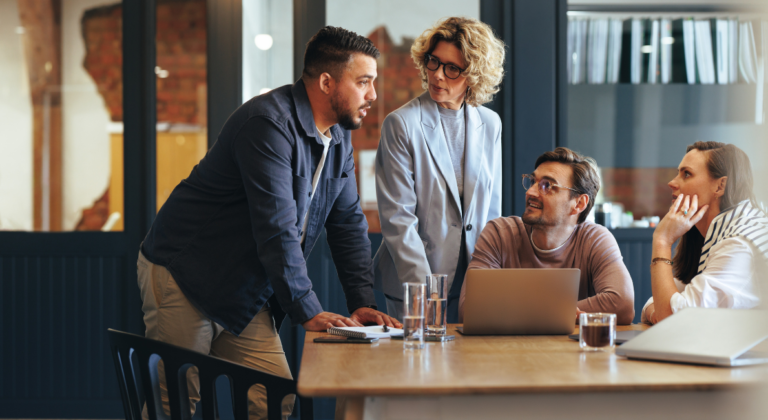 Modern business team aligning people processes and technology using digital dashboards and analytics tools